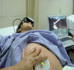 Figure 2: Woman using VR in the Labor Room